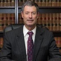 Headshot of attorney Claude D. Smith Jr.
